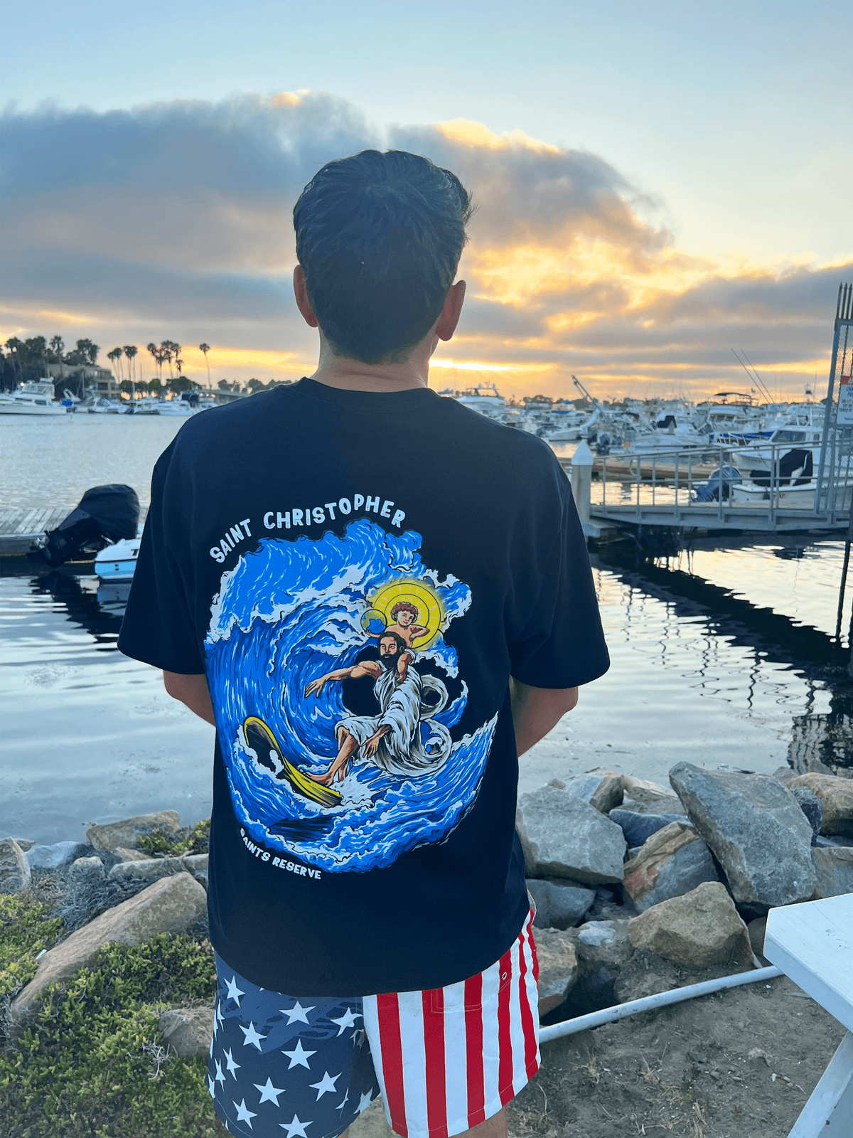 The Saint Christopher shirt at the marina at sunset