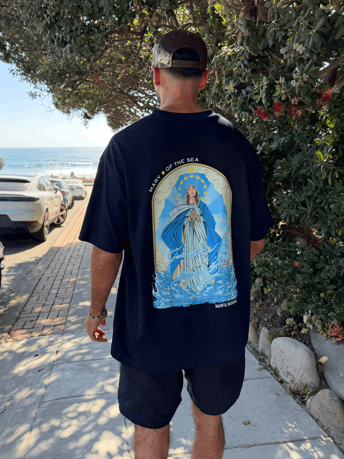 The Mary Star of the Sea shirt on a path by the sea